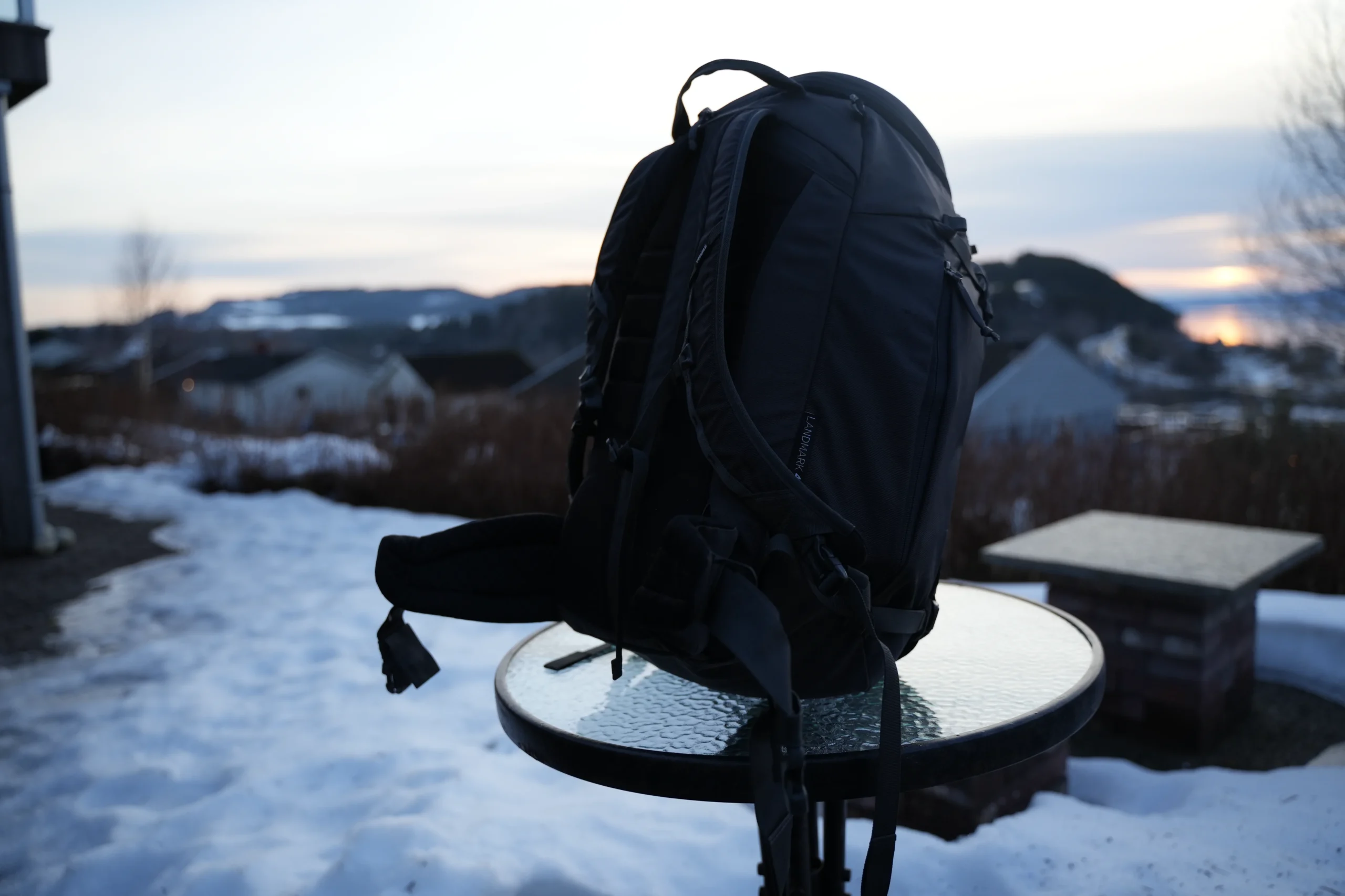 Thule Landmark 40 silhouette against sunset panorama