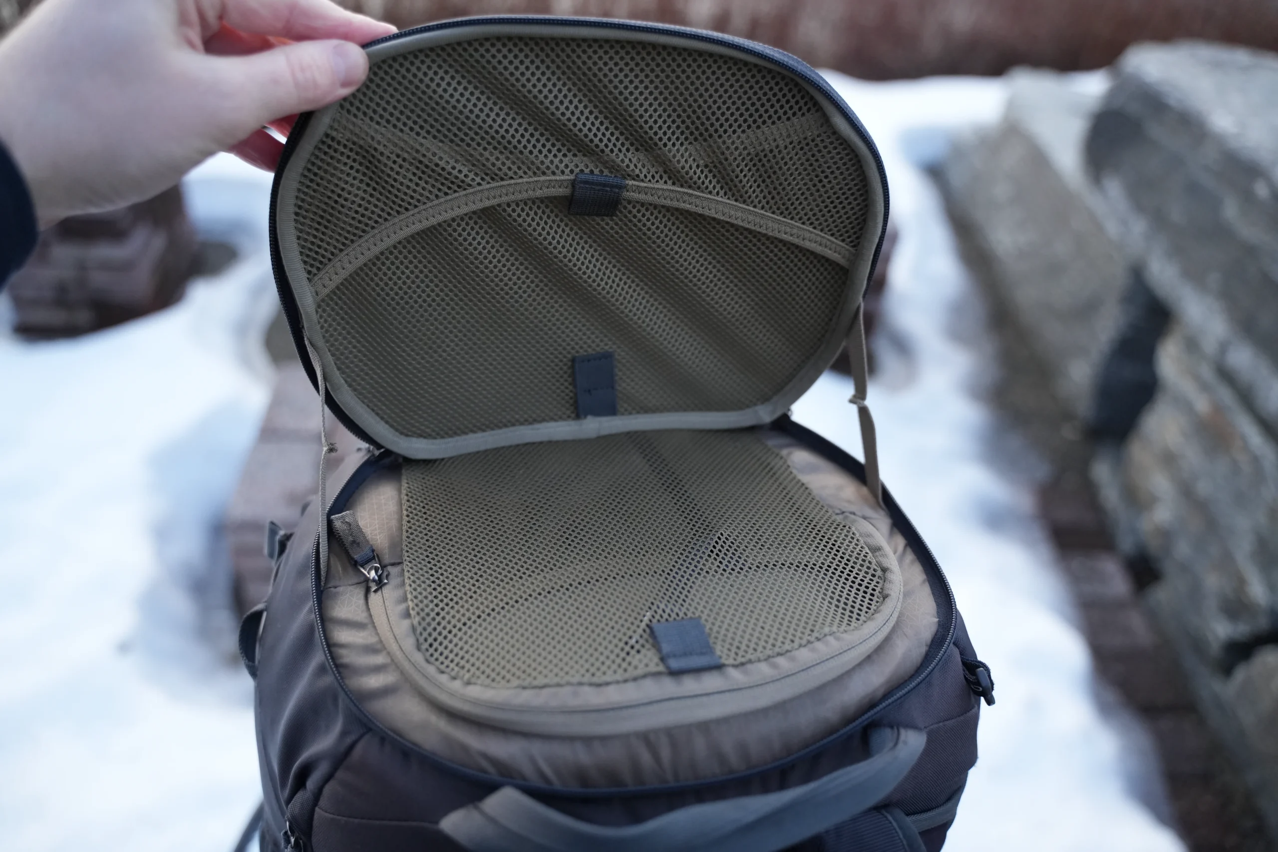 Thule Landmark 40 SafeZone compartment open showing mesh pockets and interior