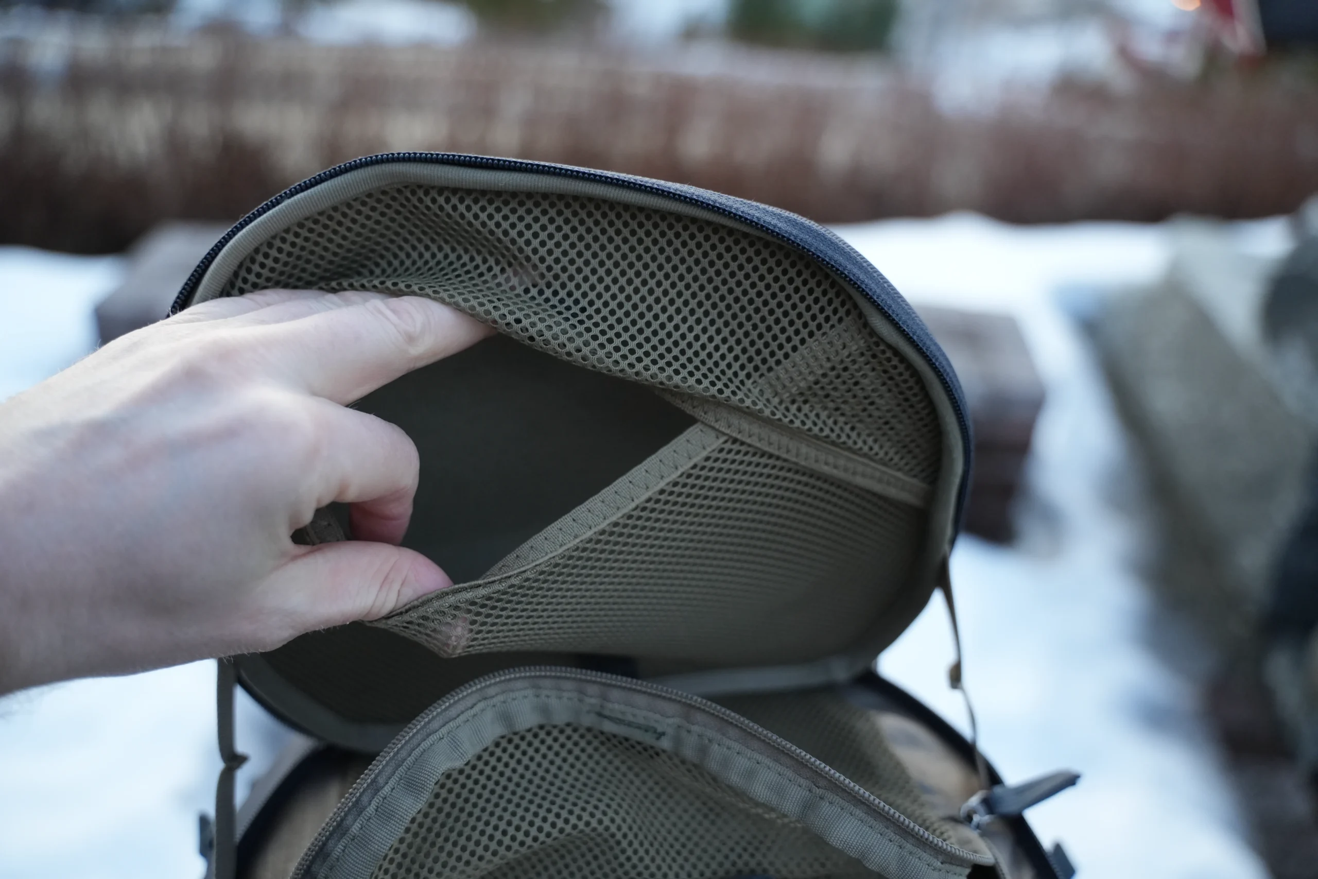 Thule Landmark 40 SafeZone mesh pocket with passport stored inside