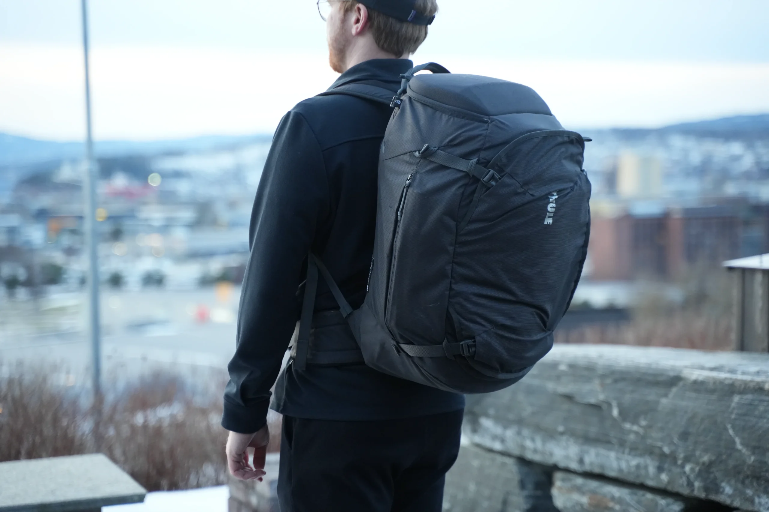 Thule Landmark 40 worn from rear right quarter angle