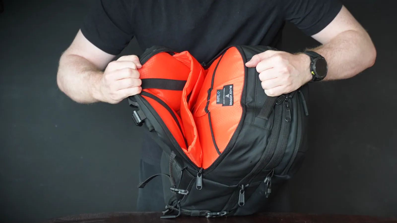 Zephyr Pro Lite laptop compartment with red lining and tech organization