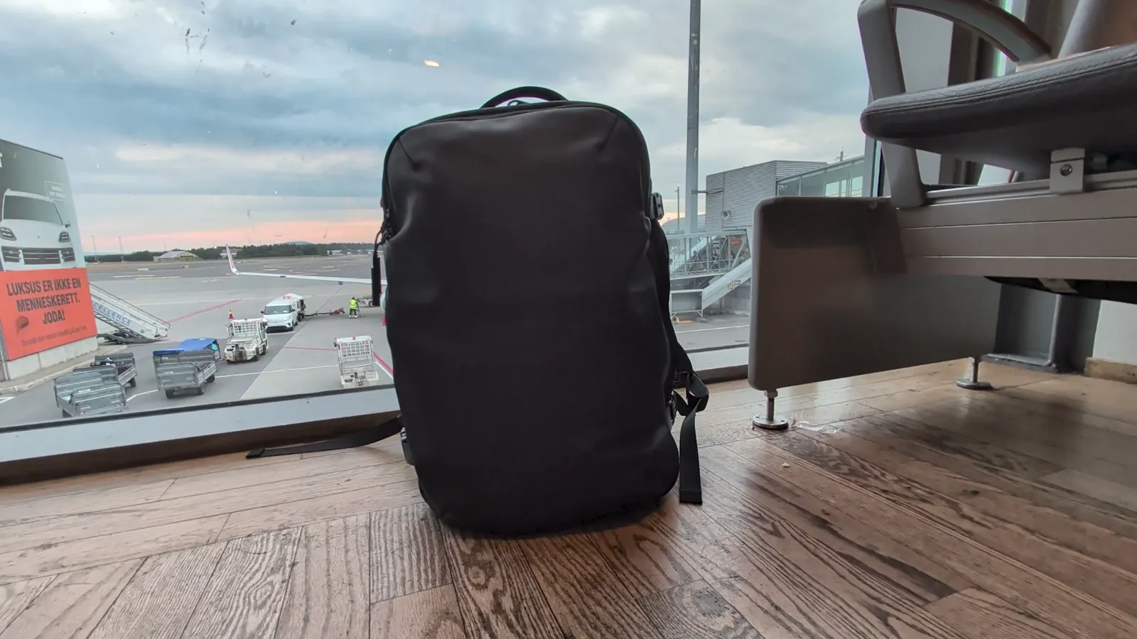 Zephyr Pro Lite as carry-on luggage at an airport window